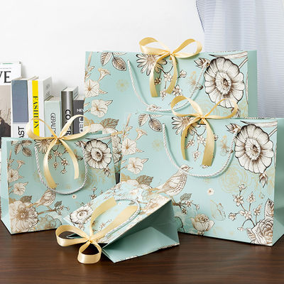 Túi giấy tùy chỉnh bán buôn giấy Eco mua sắm bao bì túi quà túi giấy in với logo của riêng bạn