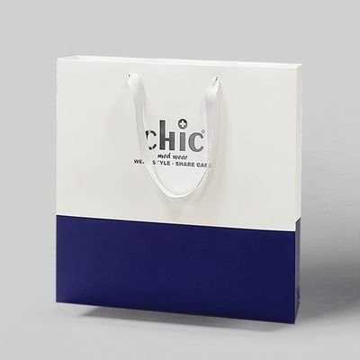 Tote giấy mua sắm túi bạc dán bằng tay cầm cho quần áo may mặc
