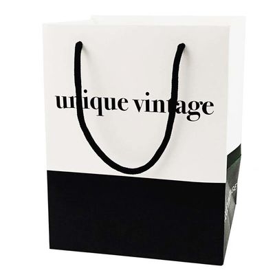 Logo tùy chỉnh quần áo mua sắm đóng gói quà giấy túi với dây kéo và lớp phủ tia UV