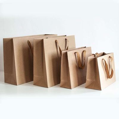 Túi giấy Kraft màu nâu túi mua sắm Offset in ấn quần áo túi giấy Logo tùy chỉnh