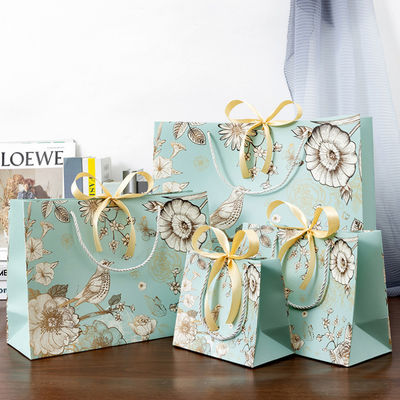 Túi giấy tùy chỉnh bán buôn giấy Eco mua sắm bao bì túi quà túi giấy in với logo của riêng bạn