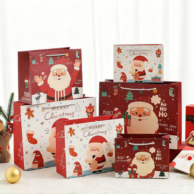 Kích thước tùy chỉnh Chất in Kraft túi Giáng sinh túi quà sang trọng với tay cầm ruy băng